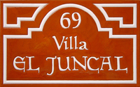 Villa El Juncal sign